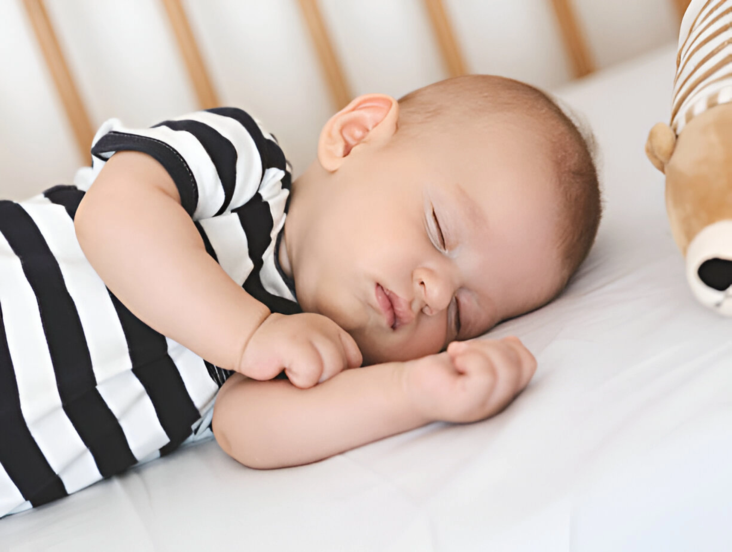 Pro Tips to Improve Your Toddler’s Sleep Routine- Toddler Climbing Out of Crib 